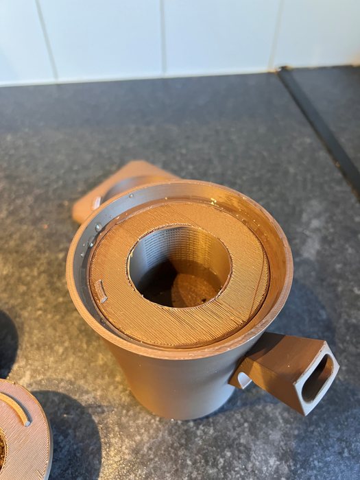 Step 2: Fit the large strainer