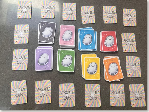 Printed potato cards surrounded by forfeit cards